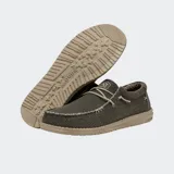 Zapatos Hey Dude modelo Wally Braided, confeccionados en tejido textil color marrón con cordones elásticos beige, costuras visibles en el empeine y suela ligera de goma.