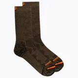 Medias de caña alta color marrón oscuro, de diseño técnico con detalles en naranja en la puntera y el talón.
