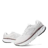Championes New Balance Evoz V4 para running, color blanco con detalles en gris y suela negra.