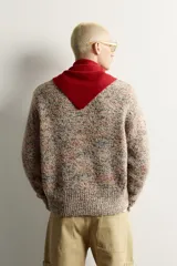 Jersey de corte relajado tejido con hilatura de lana, con cuello redondo y manga larga, de diseño multicolor con motas en contraste.