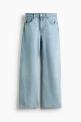 Jean de cinco bolsillos en denim de algodón con diseño de tiro alto y piernas amplias de corte holgado.