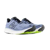 Championes de running New Balance Fresh Foam X 1080v12, color celeste con detalles en negro y verde flúor.