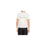 Remera blanca de manga corta Saint Laurent con cuello redondo y el logotipo de la marca impreso de manera invertida en el pecho.