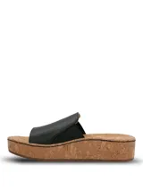 Sandalias Hush Puppies modelo Corla, color negro, con plataforma de corcho y capellada de cuero con detalle elástico lateral y etiqueta de la marca.