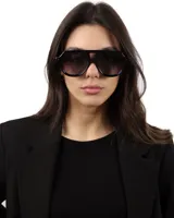 Lentes de sol negros estilo aviador con montura gruesa de acetato. Lentes polarizados con protección UV400.