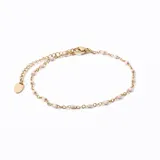 Pulsera dorada con eslabones y pequeñas cuentas rosadas.