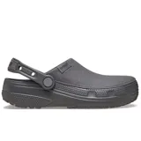 Zuecos Crocs modelo Classic Crafted Clog de color gris, con capellada de lona textil suave, suela Croslite y correa de talón pivotante.