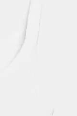 Musculosa de rib color gris claro melange, confeccionada en algodón, con escote redondo y tirantes finos.