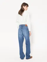 Jeans de tiro alto color azul, de corte recto y confeccionado en denim rígido.