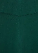 Pantalon wideleg de tejido de punto fino, con cintura elástica y diseño largo de corte fluido.