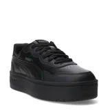 Championes urbanos Puma modelo Court Lally Skye, de diseño monocromático negro con plataforma elevada y cierre de cordones.