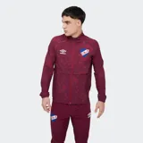 Campera deportiva Umbro del Club Nacional de Football, modelo Grok de color azul con estampado abstracto, cuello alto, cierre frontal completo y bolsillos laterales.