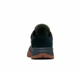 Calzado deportivo Columbia modelo Fairbanks Low Techlite, en color verde oliva con detalles en naranja y suela de caucho marrón con patrón texturizado. Cuenta con empeine de malla transpirable, sistema de cordones elásticos y tecnología Omni-Grip para mayor tracción.