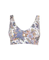 Top de bikini con estampado floral en tonos azules, celestes, marrones y blancos.
