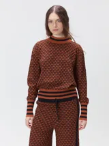 Sweater polera Mutma tivo de tejido de punto jacquard con textura, cuello alto y puños acanalados.