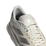 Championes de running Adidas modelo Duramo SL 2, color blanco con detalles en beige y suela de goma color caramelo. Presentan el diseño clásico de las tres tiras en los laterales y tecnología de amortiguación en la entresuela.