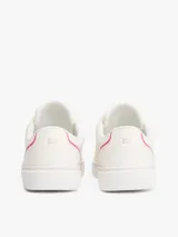 Zapatillas urbanas Tommy Hilfiger color blanco con detalle rosa en el talón y logo dorado en la suela.