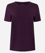 Remera deportiva de manga corta color bordó, con cuello redondo y diseño en tejido de poliamida elástica.