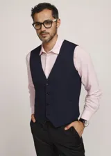 Chaleco reversible Due Volti de corte sastrero, con diseño a cuadros en tonos de gris y cierre frontal con cuatro botones oscuros.