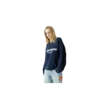 Sweater de punto color azul marino de Eme Studios, con cuello redondo y diseño de tejido texturizado en zigzag. Presenta el logotipo de la marca estampado en el pecho en color blanco, acompañado de texto descriptivo debajo.