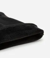 Guantes femeninos de diseño liso, confeccionados en poliéster con acabado tipo gamuza, sin puño y de corte clásico.