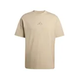 Remera de algodón color beige con cuello redondo acanalado, corte holgado y logo de Adidas bordado en el centro del pecho.