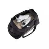 Bolso deportivo Puma Fundamental Sport, color negro con detalles en blanco, correas de mano y bolsillo lateral de red.