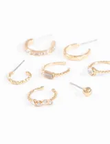 Set de aros plateados con strass, incluye aros tipo argolla y earcuffs.