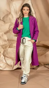 Pantalón color verde de simil cuero, corte babucha y cintura elastizada.