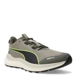 Championes de trail running Puma Reflect Lite, color beige con detalles en negro y amarillo. Presentan suela de goma con tecnología PROTREAD y entresuela de espuma EVA PUMALite.