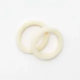 Pack de 10 gomas elásticas para el pelo en tonos variados, incluyendo verde oliva, beige, rosa suave y texturas brillantes.