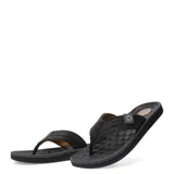 Sandalias tipo ojota para hombre, con diseño ergonómico y plantilla anatómica. Presentan tiras anchas de material sintético con textura y detalle de logo circular en el lateral.