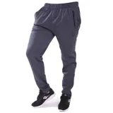 Pantalón deportivo Topper de corte ajustado, confeccionado en tejido fleece color gris oscuro melange. Cuenta con cintura elástica, bolsillos laterales con cierre y logo de la marca bordado en la pierna.