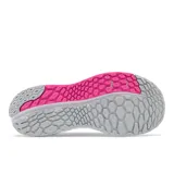 Championes New Balance para dama, modelo WVNGOGG4, color gris con detalles en blanco y rosa.