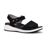 Sandalias bajas color beige con doble tira con velcro y suela blanca.