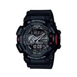 Reloj Casio G-Shock negro con detalles en rojo, analógico-digital, resistente al agua y a los golpes.