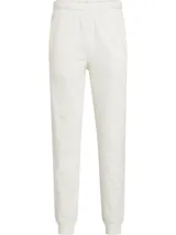 Pantalón de jogging blanco de algodón, modal y poliéster, con cintura elástica, tobillos con punto canalé, bolsillos laterales, talle medio e insignia con logo de Calvin Klein.