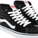 Championes de skate Vans Sk8-Hi Skate PRO, color negro con detalles en blanco. Fabricados con ante y lona, con refuerzos DURACAP™ y suela de goma SICKSTICK™.