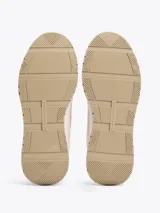 Zapatillas deportivas Tommy Hilfiger color rosa y beige, con paneles de malla y detalles distintivos de la marca, como el monograma TH en el lateral y la lengüeta.