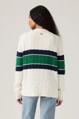 Cardigan de punto trenzado con diseño de rayas horizontales en colores verde y azul marino sobre base blanca. Presenta cierre frontal con botones, cuello en V y bolsillos laterales.