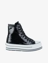 Zapatillas de caña alta con plataforma, cubiertas de lentejuelas negras.