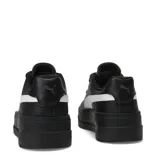 Championes Puma Karmen Classic de mujer, color negro con franja lateral blanca y suela plataforma.