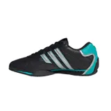 Championes Adidas Adiracer de perfil bajo inspirados en el automovilismo, en color negro con detalles plateados y turquesa. Presentan diseño de tres tiras en los laterales, empeine de cuero con inserciones sintéticas y suela de goma.