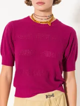 Sweater color beige tejido en bucle, mangas cortas y espalda con abertura.