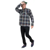 Camisa de manga larga con estampado a cuadros en tonos marrón, azul y celeste. Tiene dos bolsillos en el pecho con cierre de botón.