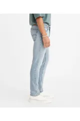 Pantalón de jean celeste de corte skinny, tiro medio y confeccionado en tejido rígido.