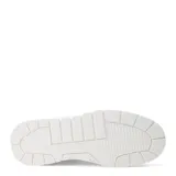 Championes urbanos de diseño moderno, combinando paneles en color beige y blanco. Presentan una silueta robusta con suela de plataforma en tono crema y base de goma, cordones al tono y detalle de textura perforada en los laterales.