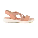 Sandalias bajas color salmón con tiras cruzadas elásticas y ajuste con velcro en el tobillo.