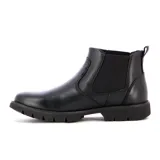 Bota tipo Chelsea de cuero negro con paneles elásticos laterales y suela de goma dentada.