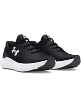 Championes de running Under Armour Charged Surge 4, color negro con logo blanco y suela blanca.